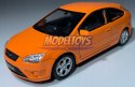 Ford Focus pomarańcz 1:34 Welly 42378