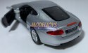 Jaguar XK Coupe srebrny 1:34 Welly 42395F