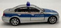 BMW 330i policja 1:34 Welly 42364F