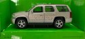 Chevrolet Tahoe '08 biały police 1:34 Welly 43607