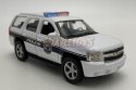 Chevrolet Tahoe '08 biały police 1:34 Welly 43607