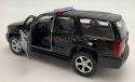 Chevrolet Tahoe '08 czarny police 1:34 Welly 43607