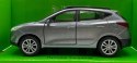 Hyundai Tucson IX niebieski 1:34 Welly 43648F