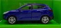 Hyundai Tucson IX niebieski 1:34 Welly 43648F