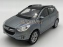 Hyundai Tucson IX niebieski 1:34 Welly 43648F