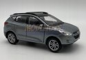 Hyundai Tucson IX niebieski 1:34 Welly 43648F