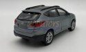 Hyundai Tucson IX niebieski 1:34 Welly 43648F