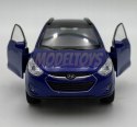 Hyundai Tucson IX niebieski 1:34 Welly 43648F