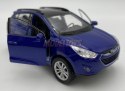 Hyundai Tucson IX niebieski 1:34 Welly 43648F