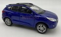 Hyundai Tucson IX niebieski 1:34 Welly 43648F