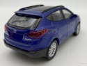 Hyundai Tucson IX niebieski 1:34 Welly 43648F