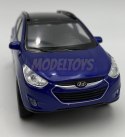 Hyundai Tucson IX niebieski 1:34 Welly 43648F