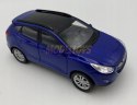 Hyundai Tucson IX niebieski 1:34 Welly 43648F