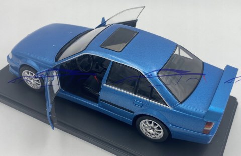 Opel Omega Evolution 500 1991 model WhiteBox 1:24 Opel Omega Evolution 500 1991 model WhiteBox 1:24