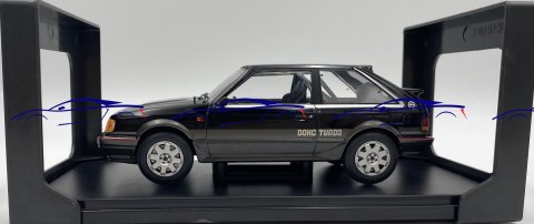 Mazda 323 4WD Turbo 1989 model 124222 WhiteBox 1:24 czarny Mazda 323 4WD Turbo 1989 model 124222 WhiteBox 1:24 czarny
