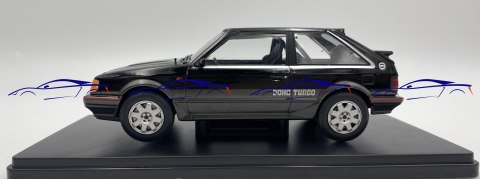 Mazda 323 4WD Turbo 1989 model 124222 WhiteBox 1:24 czarny Mazda 323 4WD Turbo 1989 model 124222 WhiteBox 1:24 czarny