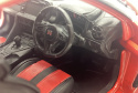 NISSAN GT-R Nismo R35 2021 model 124231 WhiteBox 1:24 czerwony