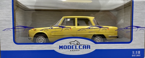 Alfa Romeo Giulia Nuova Super 1974 1:18 model MCG 18334 żółty Alfa Romeo Giulia Nuova Super 1974 1:18 model MCG 18334 żółty