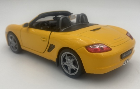 PORSCHE 987 Boxster 2012 model 22479 metal WELLY 1:24 żółty