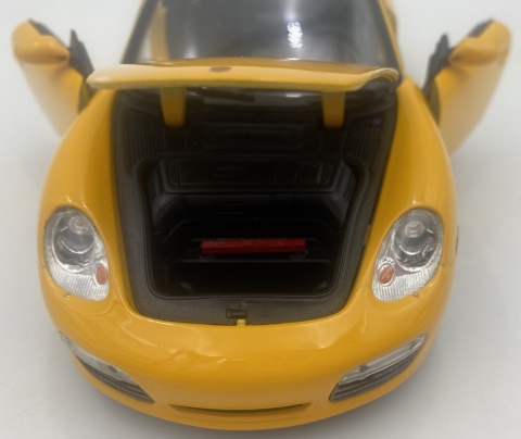 PORSCHE 987 Boxster 2012 model 22479 metal WELLY 1:24 żółty