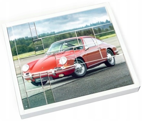 Porsche 911 z deską surfingową kalendarz adwentowy 1:43 żółty Franzis 1:43