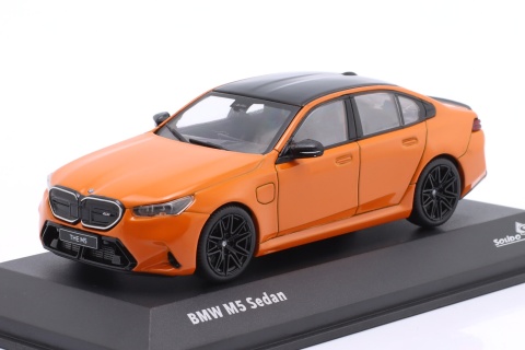 BMW M5 (G90) 2024 model S4317552 Solido 1:43 pomarańczowy