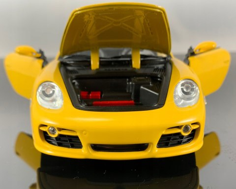 PORSCHE Cayman S yellow MODEL METAL WELLY 1:24 PORSCHE Cayman S yellow MODEL METAL WELLY 1:24